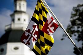 Image of Maryland State Flag hanging in front of the state capitol building