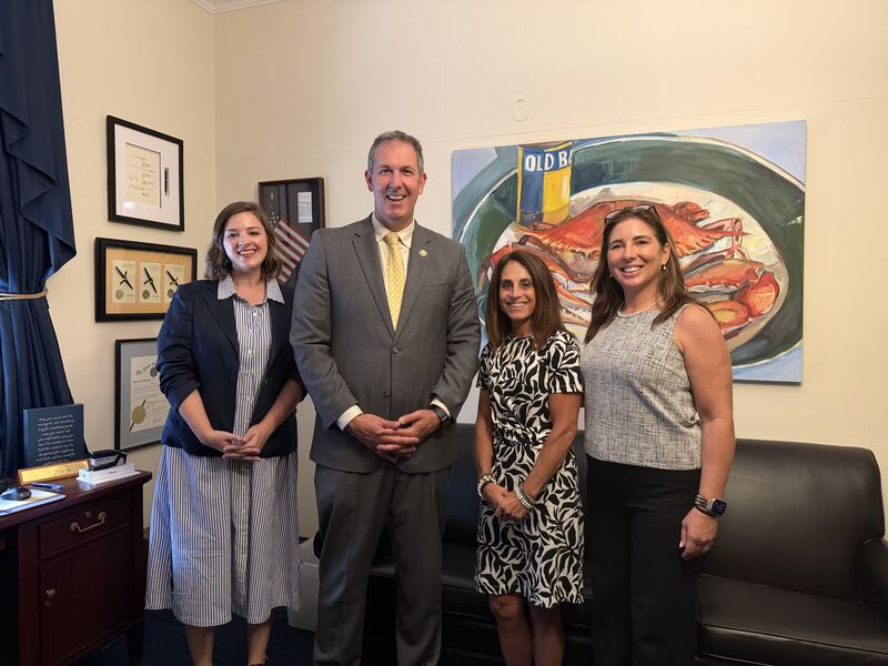 Maryland Works CEO Mary Manzoni smiles with Johnny Olszewski Jr, Stephanie Walker, and Lisa Biggica in DC.