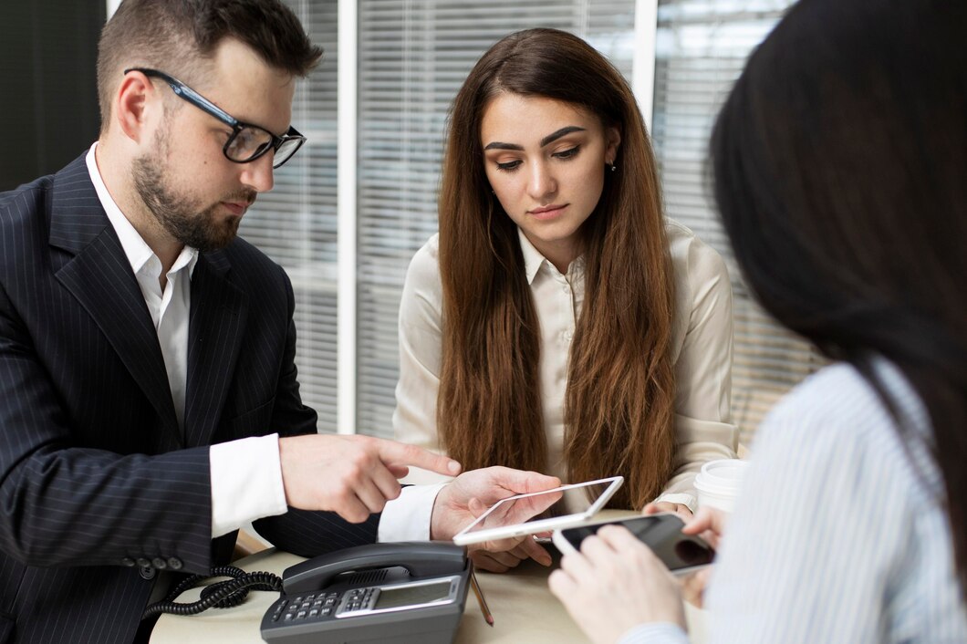 https://stratus.campaign-image.com/images/1268999000156902231_zc_v1_1724169338372_business_men_sitting_lawyers_s_desk_people_signing_important_documents_1157_40454.jpg