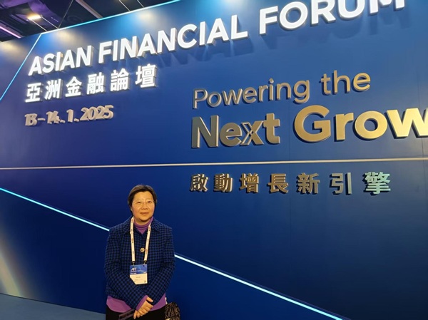 Flora in front of the AFF sign