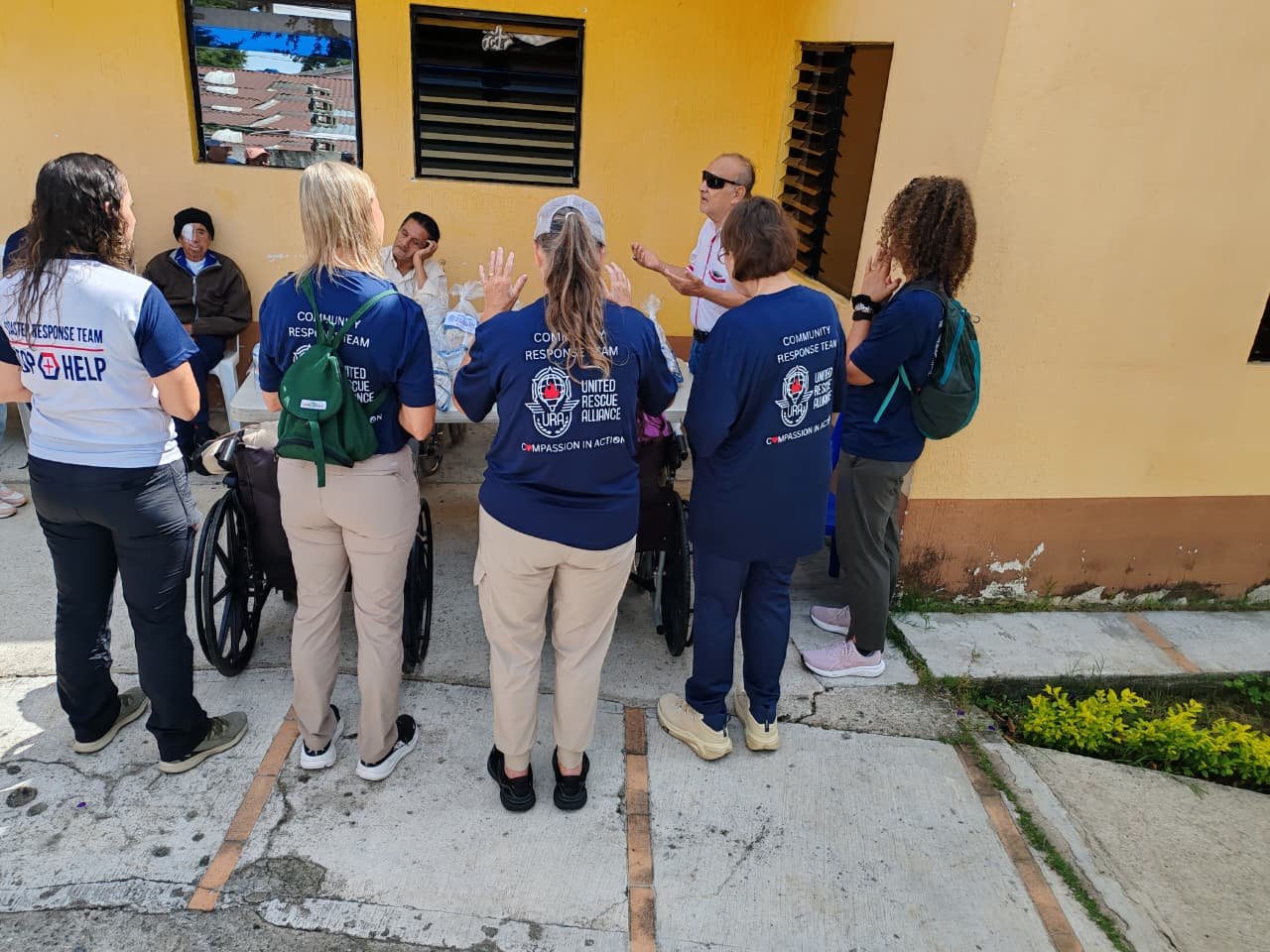 URA Guatemala team serving elderly residents