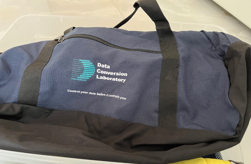 Picture of a canvas bag with the DCL logo and tagline that states,