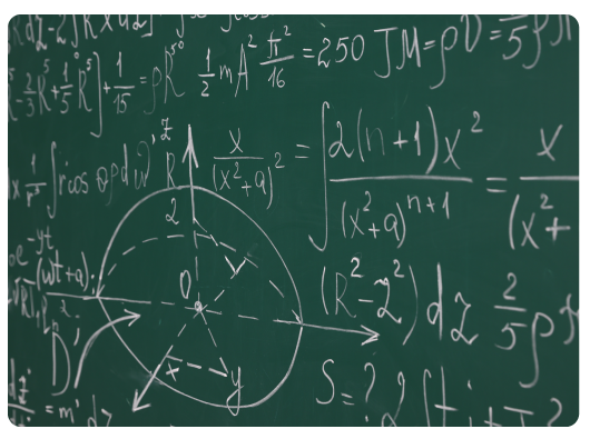 mathematical equations and graphs on chalkboard