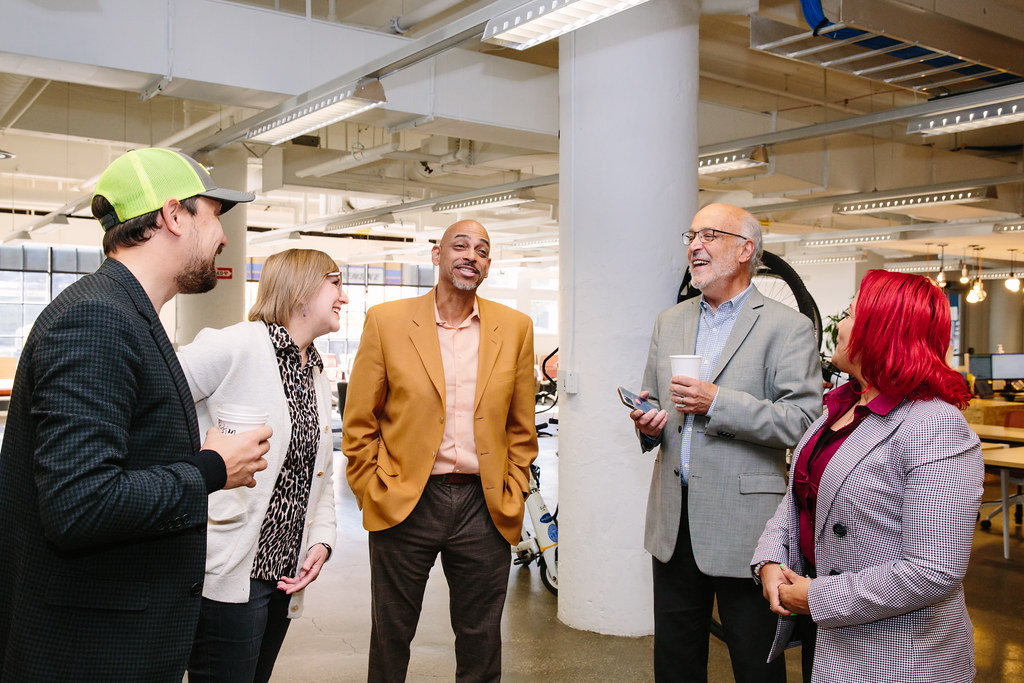 People chatting in our coworking space