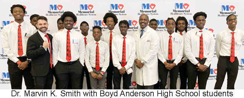 https://stratus.campaign-image.com/images/593716000020637004_zc_v1_1704908902246_dr_marvin_smith_with_boyd_anderson_high_school_students_3.jpg